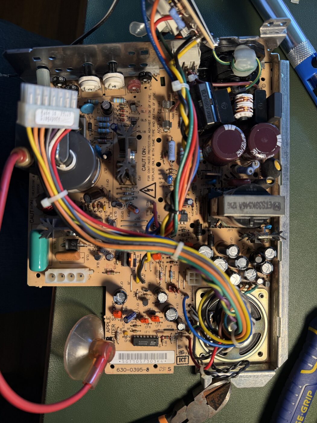 The Mac Classic analog board after recapping, with fresh capacitors and tidy wiring